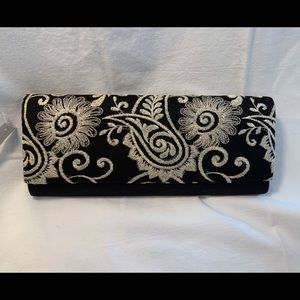 New Black formal bag with paisley gold embroidery.